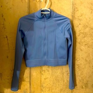 Blue zip up long sleeve shirt. Gréât for under ski-gear.